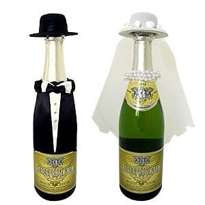 Украшение на шампанское Молодожены в шляпках Украшение на шампанское Молодожены в шляпках